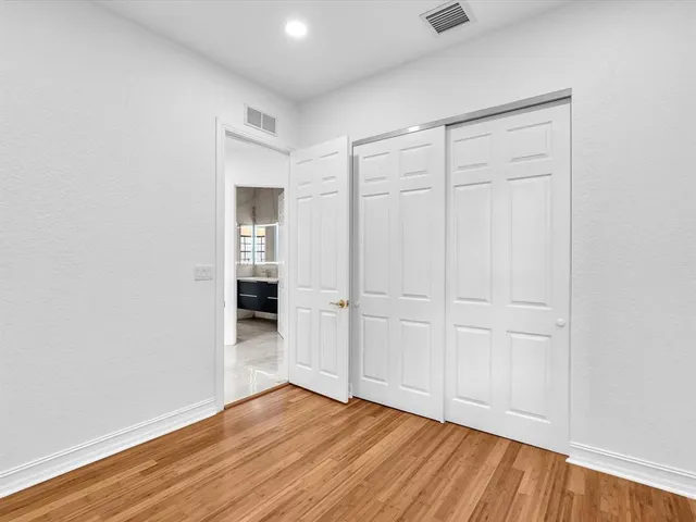 a picture of a bench in front of a door