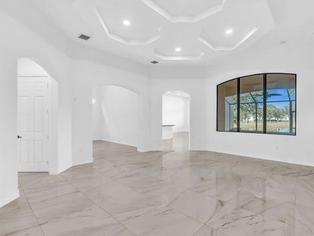 a view of a small space with a large window