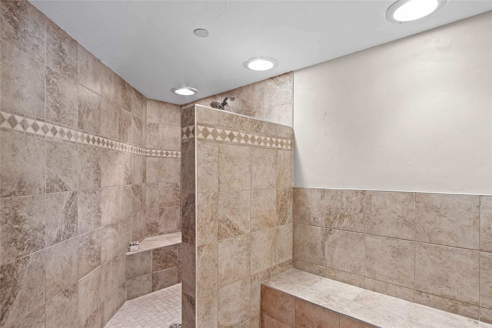 640 Village Road, Unit 4501 Breckenridge, CO 80424 - Photo 17 of 42 a bathroom with a shower