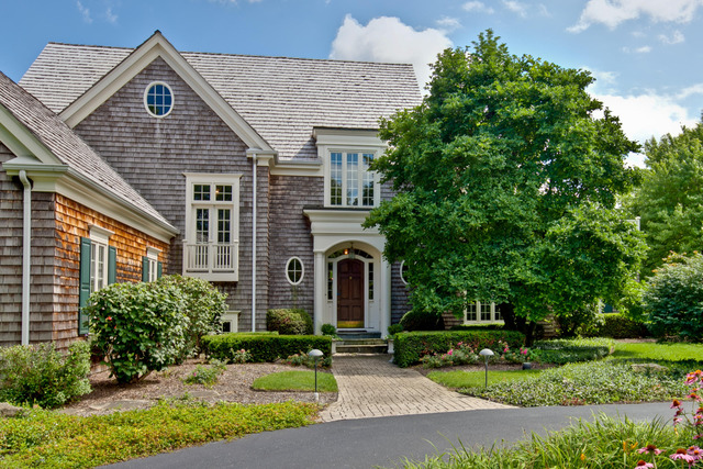 1390 Gettysburg Road Long Grove, IL 60047 - Photo 1 of 25 a front view of a house with a garden and plants