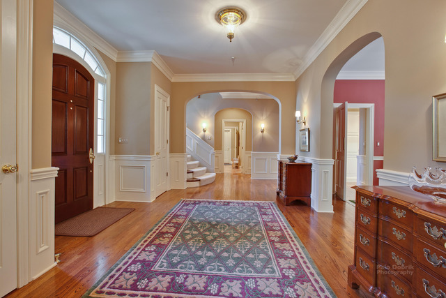 1390 Gettysburg Road Long Grove, IL 60047 - Photo 2 of 25 a large spacious bedroom with bed and wooden floor
