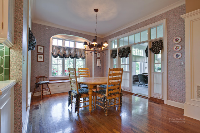 1390 Gettysburg Road Long Grove, IL 60047 - Photo 11 of 25 a view of a dining room with furniture window and wooden floor
