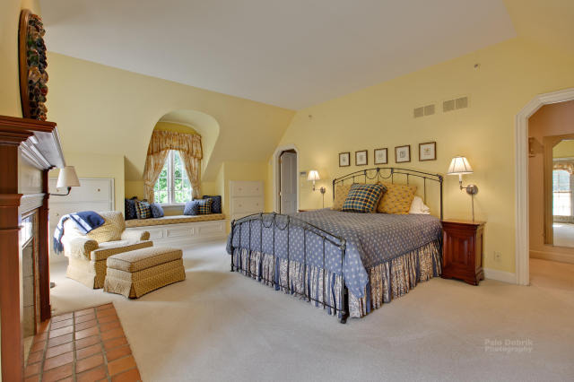 1390 Gettysburg Road Long Grove, IL 60047 - Photo 15 of 25 a spacious bedroom with a bed a couch and dresser