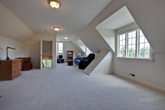 1390 Gettysburg Road Long Grove, IL 60047 - Photo 17 of 25 a living room with furniture and a chandelier