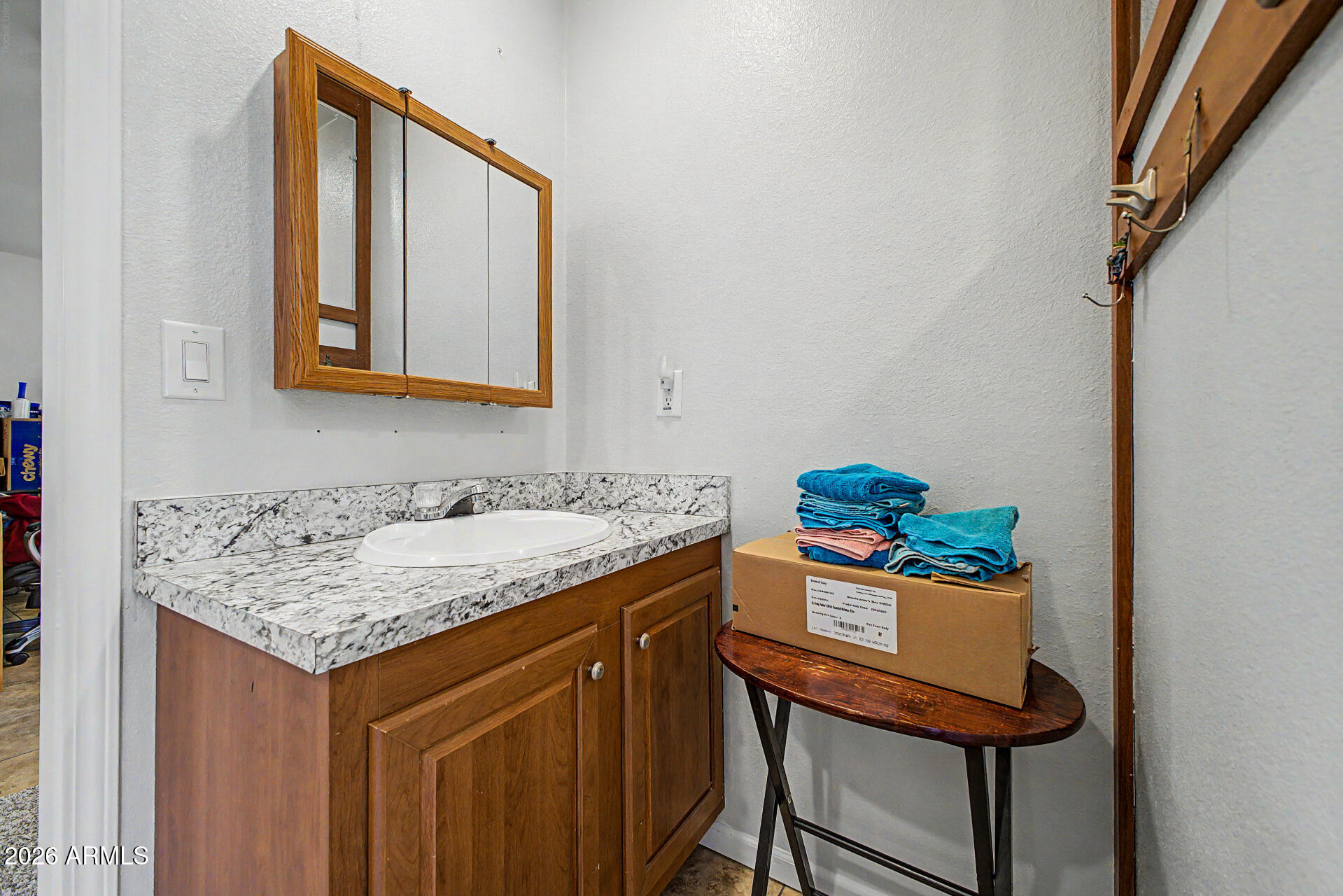 2576 West Tepee Street Apache Junction, AZ 85120 - Photo 19 of 29 a utility room with a sink and a window