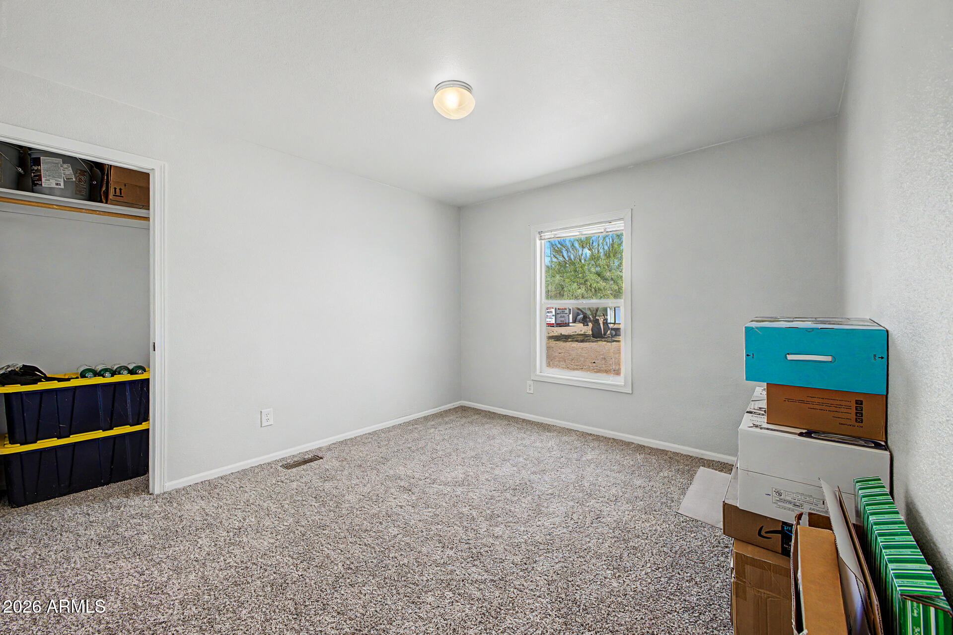 2576 West Tepee Street Apache Junction, AZ 85120 - Photo 23 of 29 a view of room with hardwood floor and a window