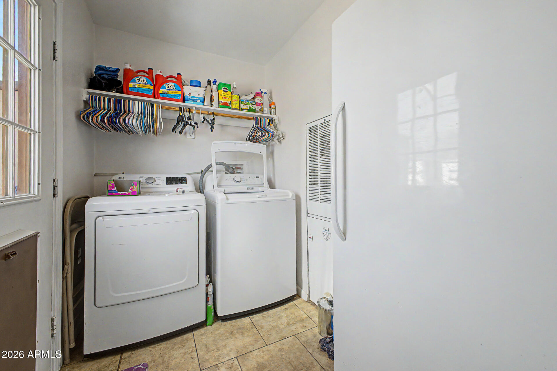 2576 West Tepee Street Apache Junction, AZ 85120 - Photo 25 of 29 a utility room with dryer and washer