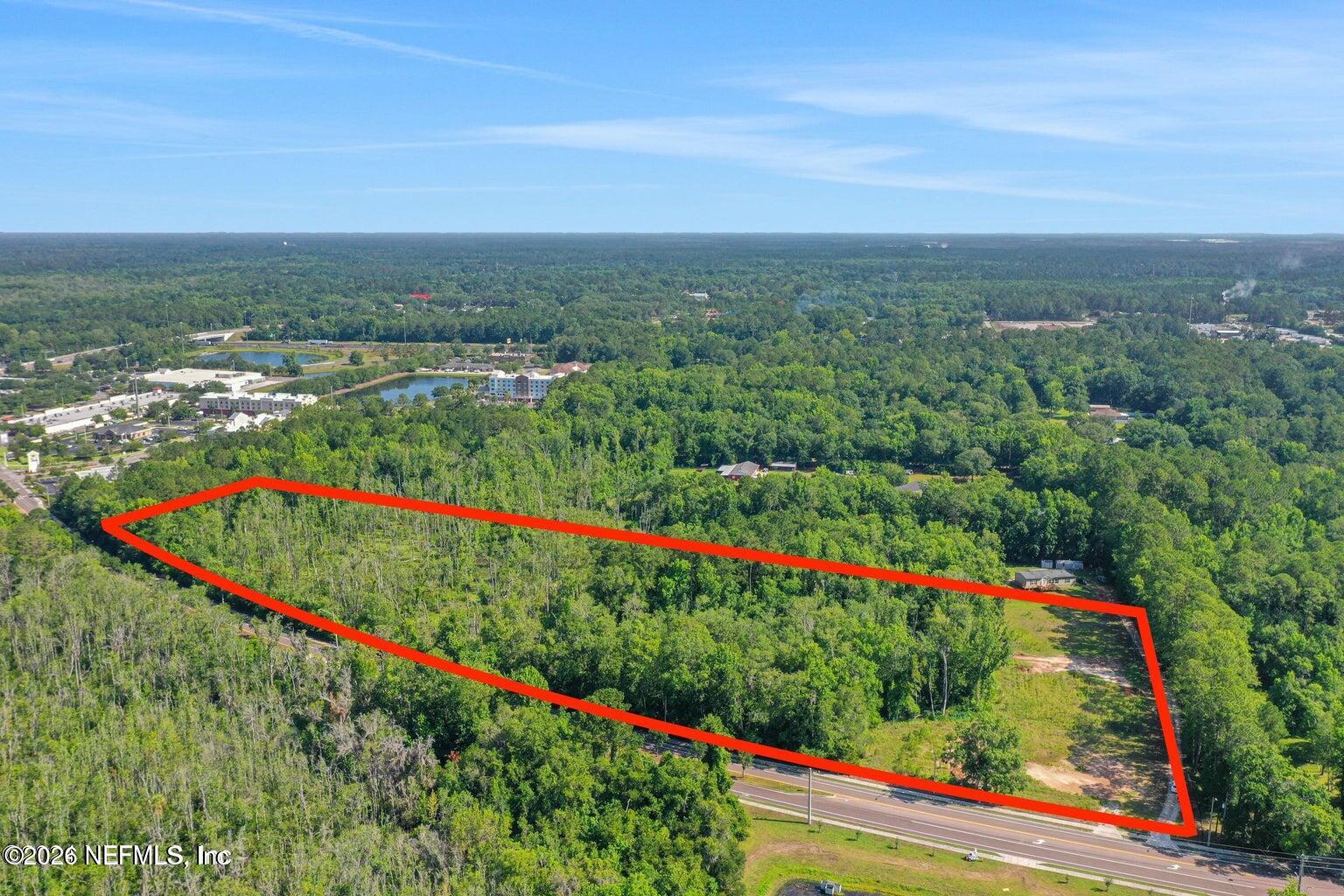 840 Forgotten Way Jacksonville, FL 32221 - Photo 5 of 6 a view of a lush green field