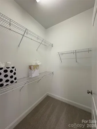 a view of a room with racks on the wall