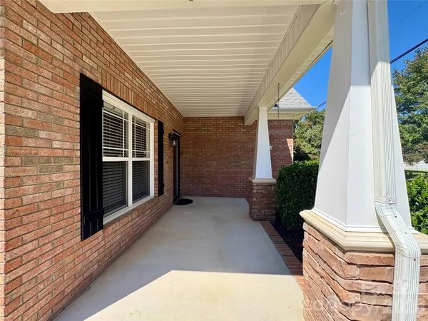 a front view of a house with a glass door