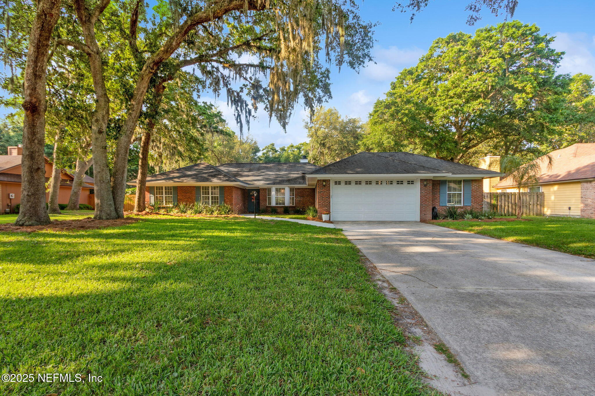 front view of a house and a yard