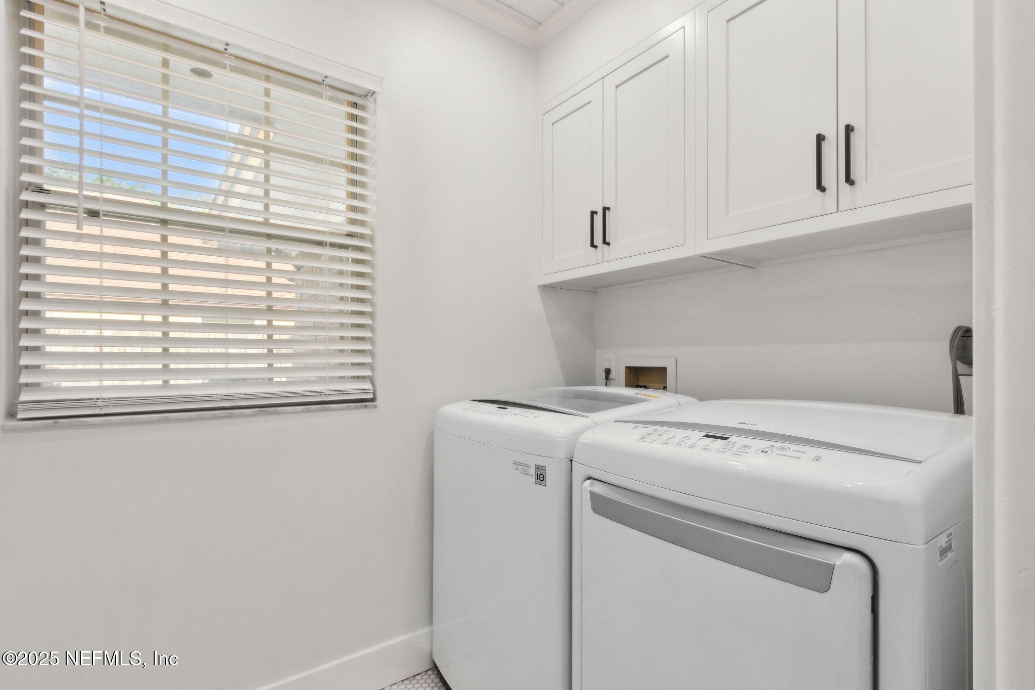 1908 Springbrook Road Fernandina Beach, FL 32034 - Photo 36 of 48 a utility room with dryer and washer