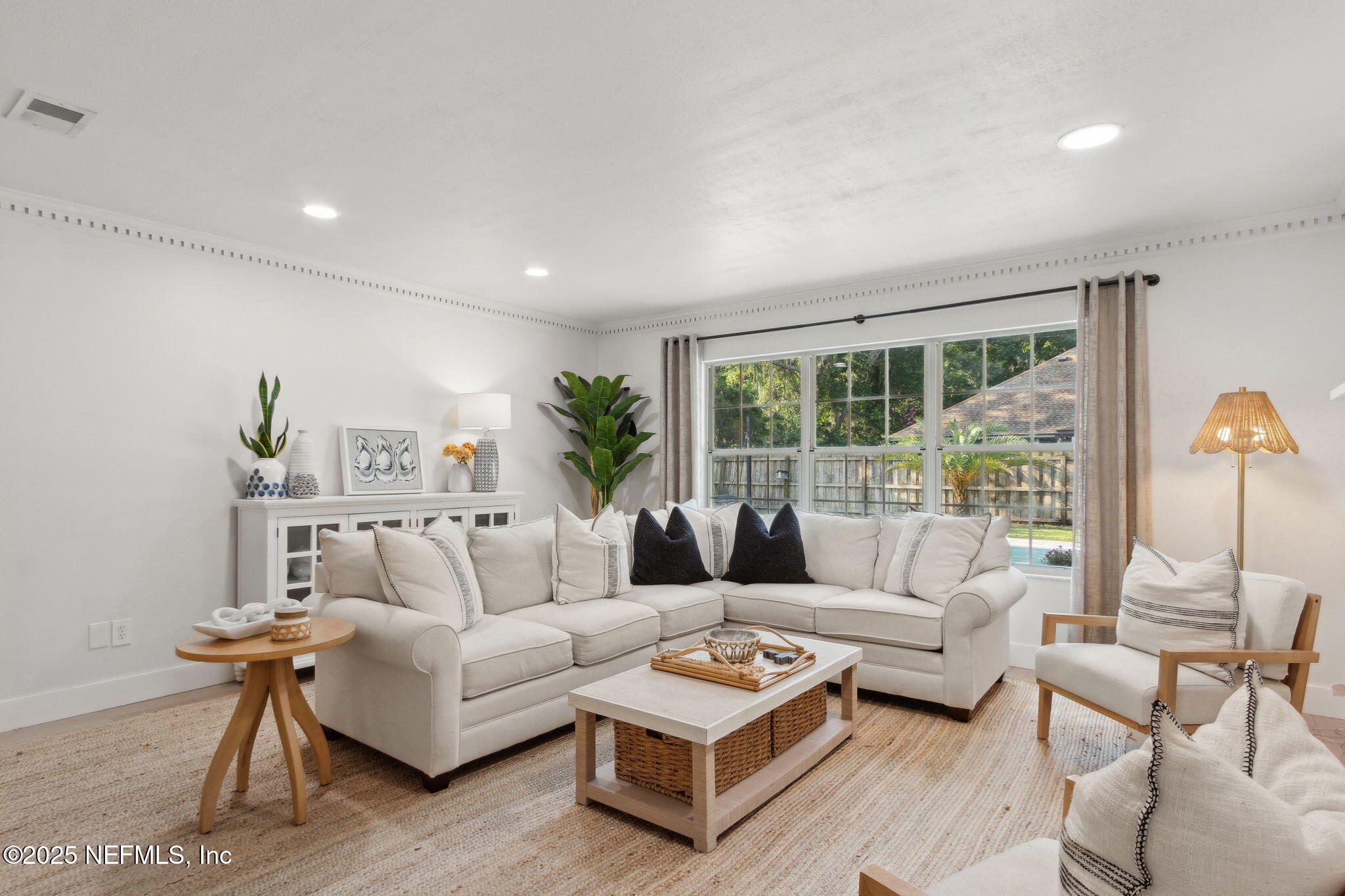 1908 Springbrook Road Fernandina Beach, FL 32034 - Photo 6 of 48 a living room with furniture and a large window