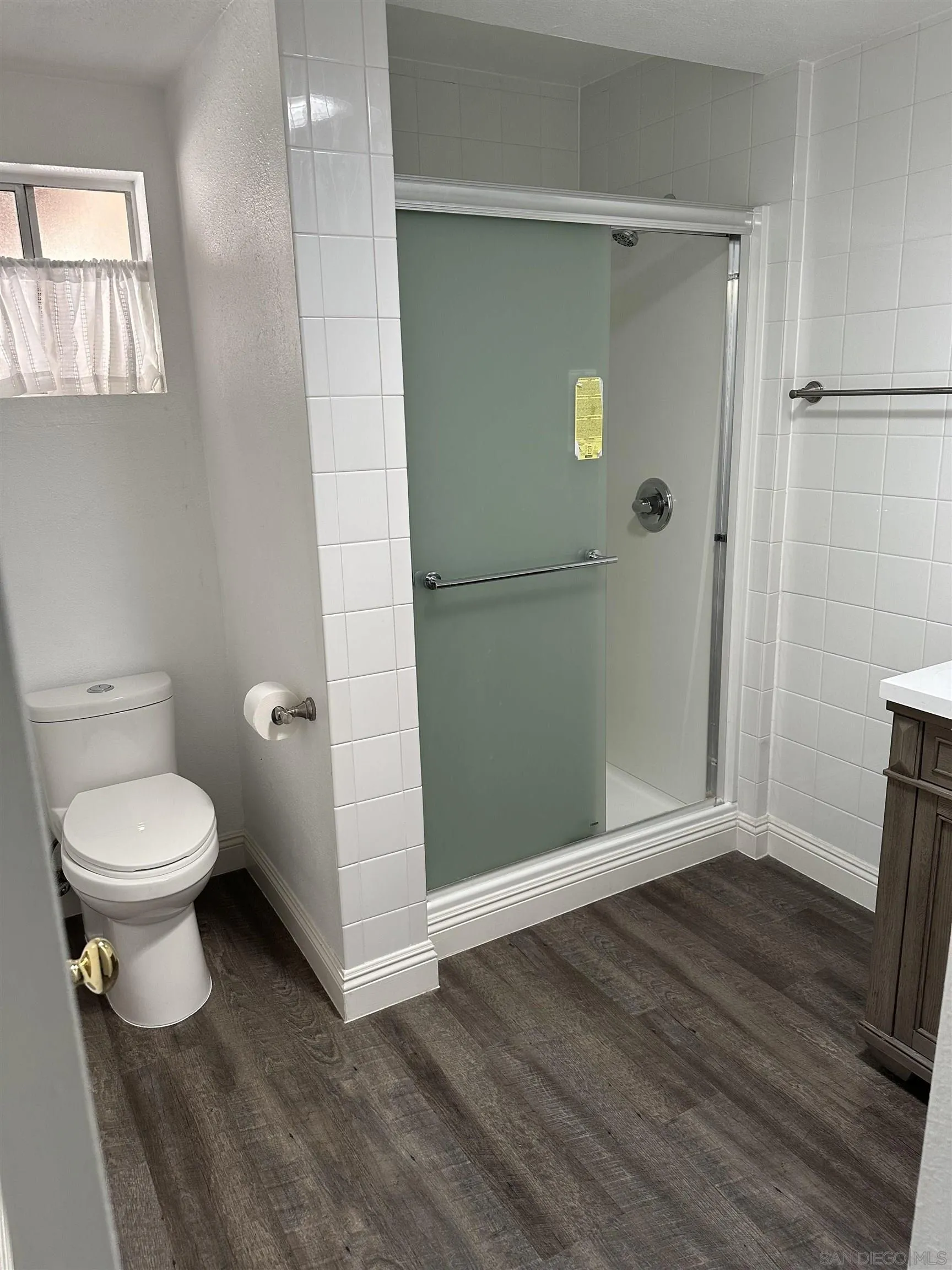 10762 Fenwick Road San Diego, CA 92126 - Photo 6 of 10 a bathroom view of a toilet and a shower