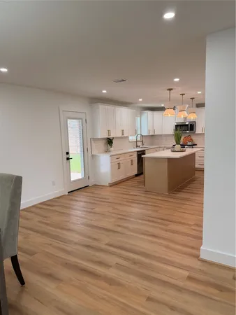 a bathroom with a shower and a toilet
