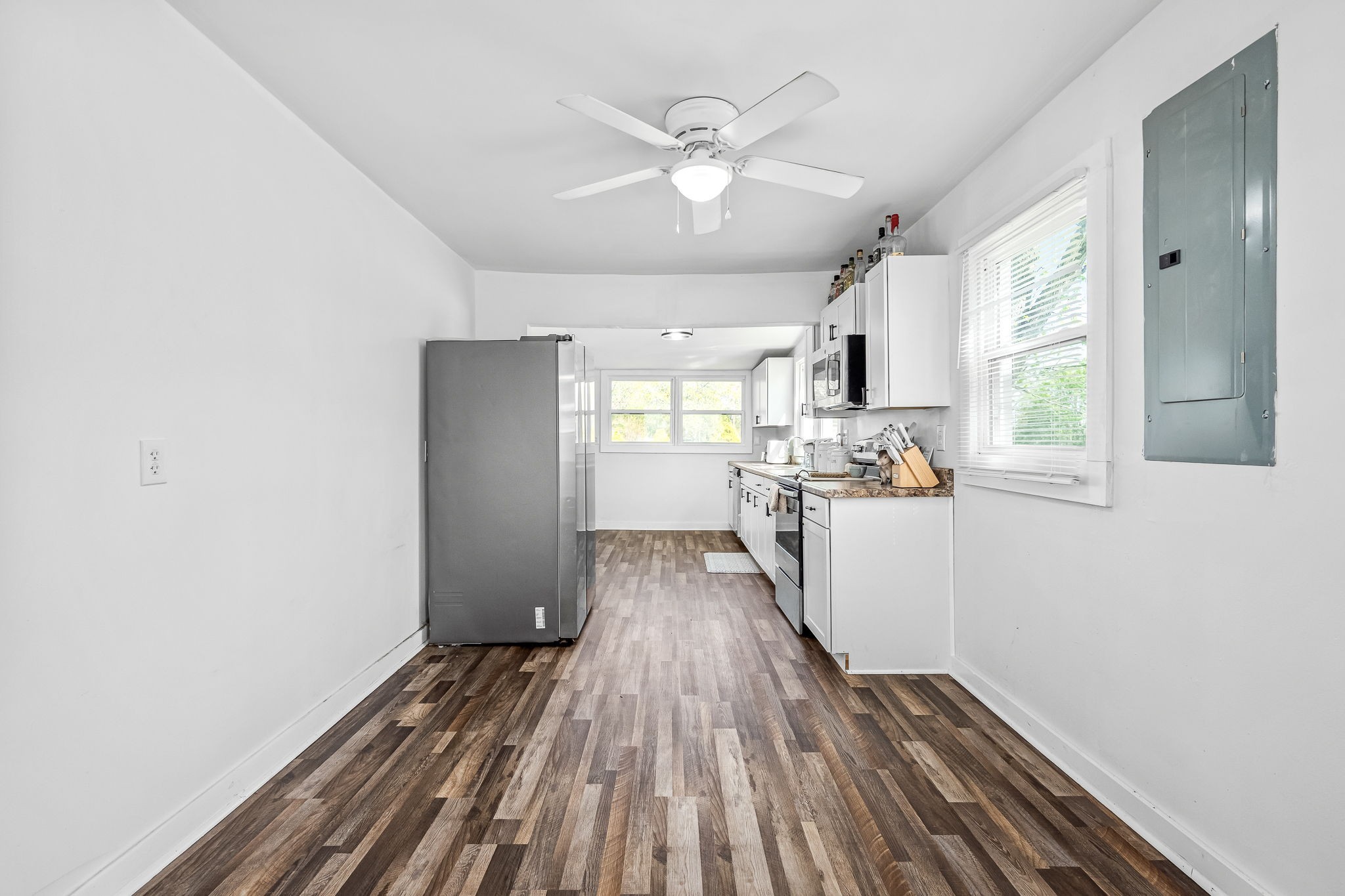 620 Maple Bend Road Winchester, TN 37398 - Photo 16 of 68 a view of a kitchen with wooden floor and a window