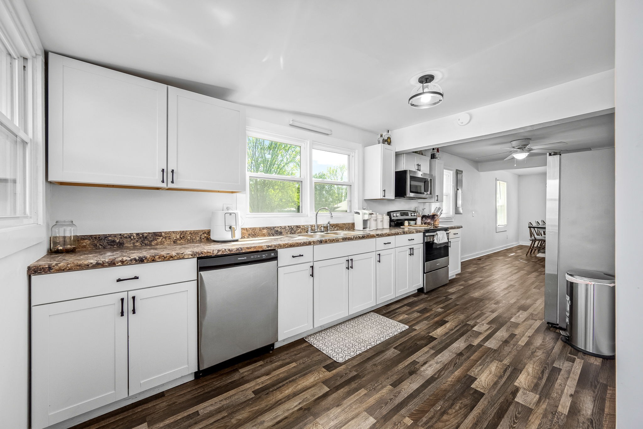 620 Maple Bend Road Winchester, TN 37398 - Photo 19 of 68 a kitchen with granite countertop a stove sink and cabinets