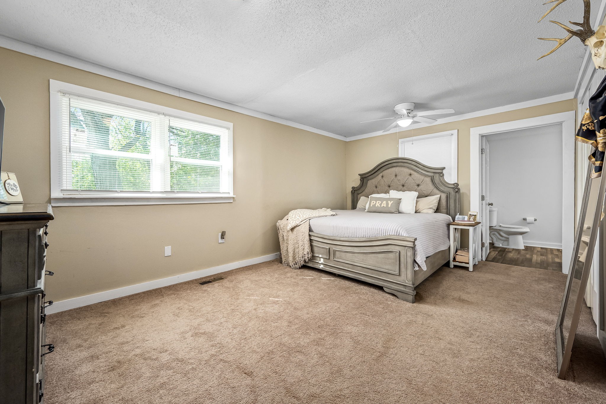620 Maple Bend Road Winchester, TN 37398 - Photo 22 of 68 a spacious bedroom with a bed and a window