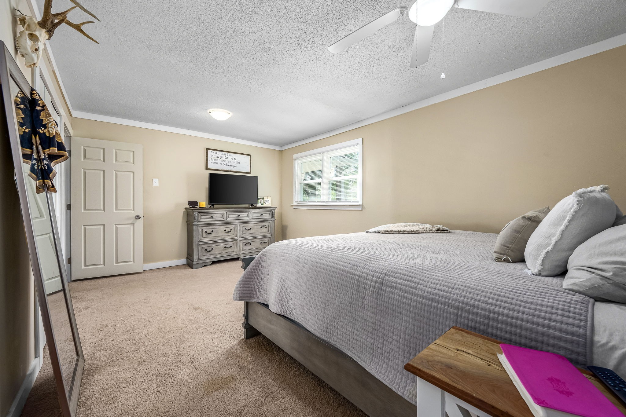 620 Maple Bend Road Winchester, TN 37398 - Photo 24 of 68 a bedroom with a bed and a flat screen tv