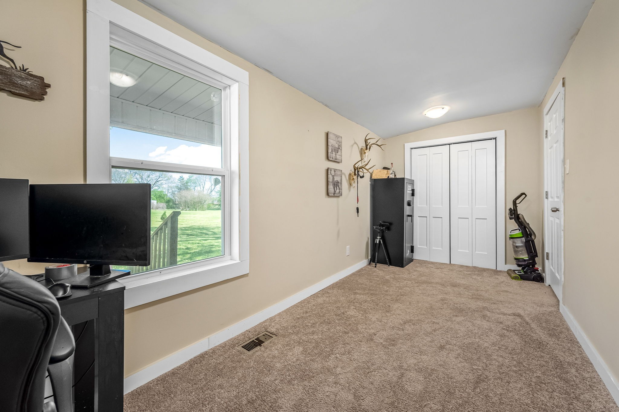 620 Maple Bend Road Winchester, TN 37398 - Photo 32 of 68 a view of a livingroom with a flat screen tv and a window