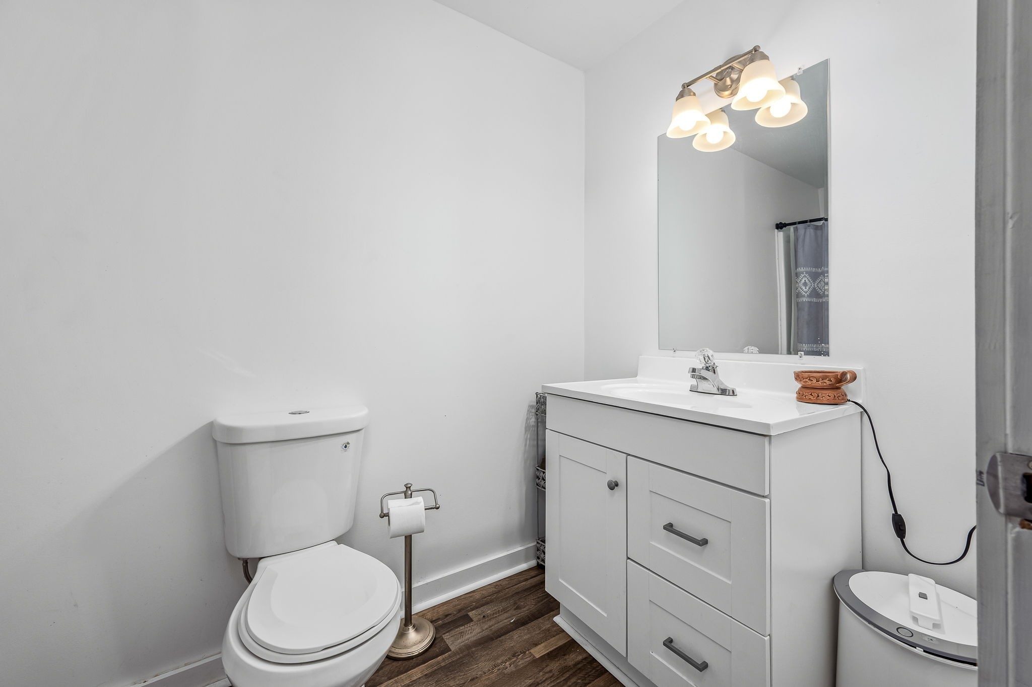 620 Maple Bend Road Winchester, TN 37398 - Photo 34 of 68 a bathroom with a toilet sink vanity and mirror