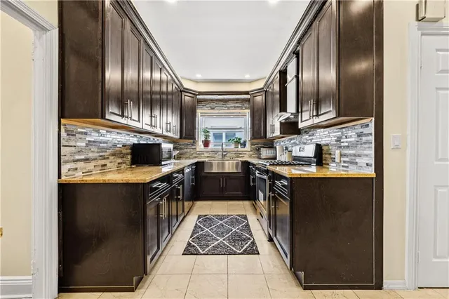 a view of a a dining room with furniture window and wooden floor