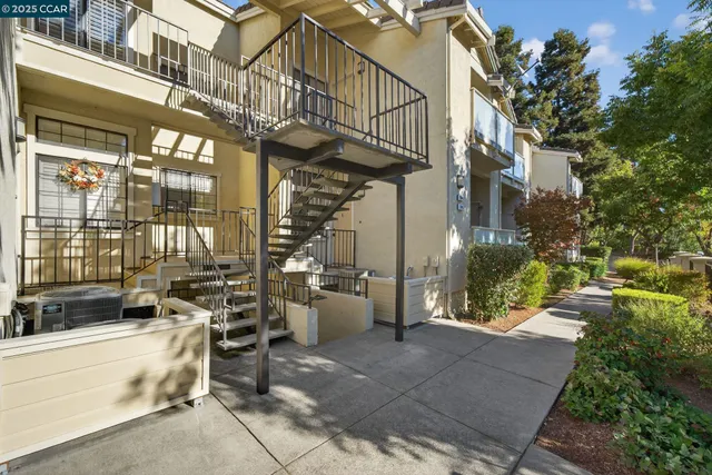 a view of a building with sitting area