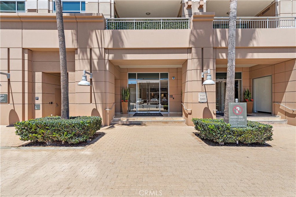 5082 Scholarship Irvine, CA 92612 - Photo 18 of 30 a view of a building with a potted plant ana a small yard