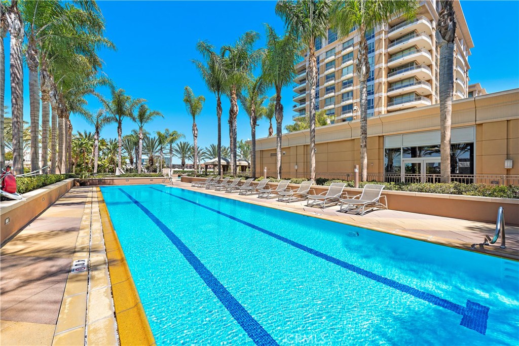 5082 Scholarship Irvine, CA 92612 - Photo 20 of 30 a swimming pool with outdoor seating and yard