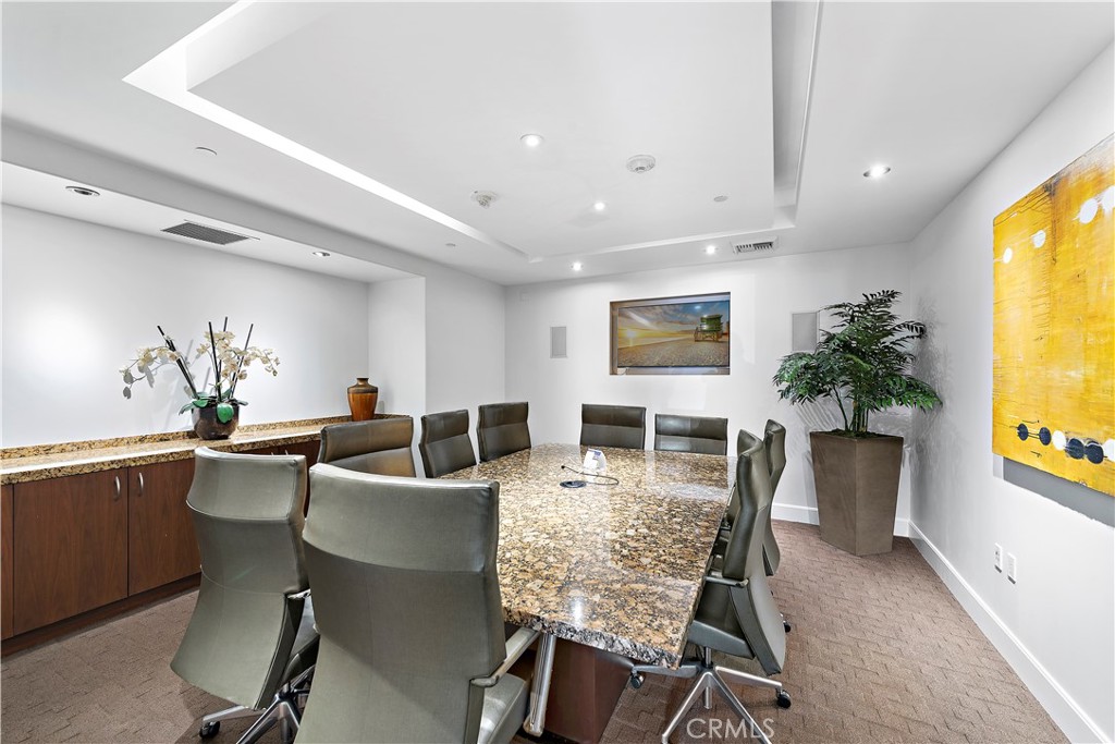5082 Scholarship Irvine, CA 92612 - Photo 26 of 30 a view of a dining room with furniture and a potted plant