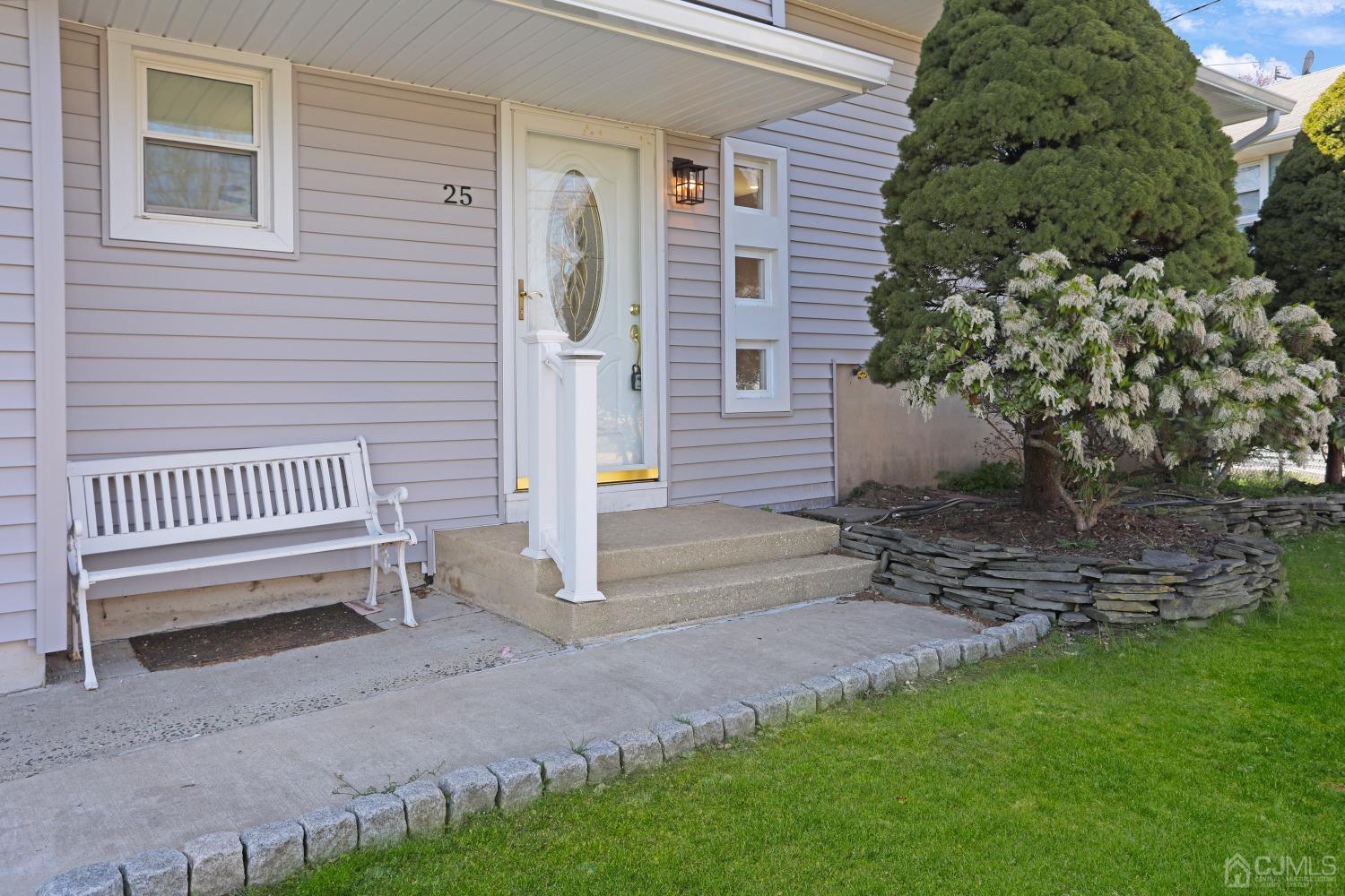 25 Mercer Road Old Bridge, NJ 08857 - Photo 2 of 30 a backyard of a house with outdoor seating