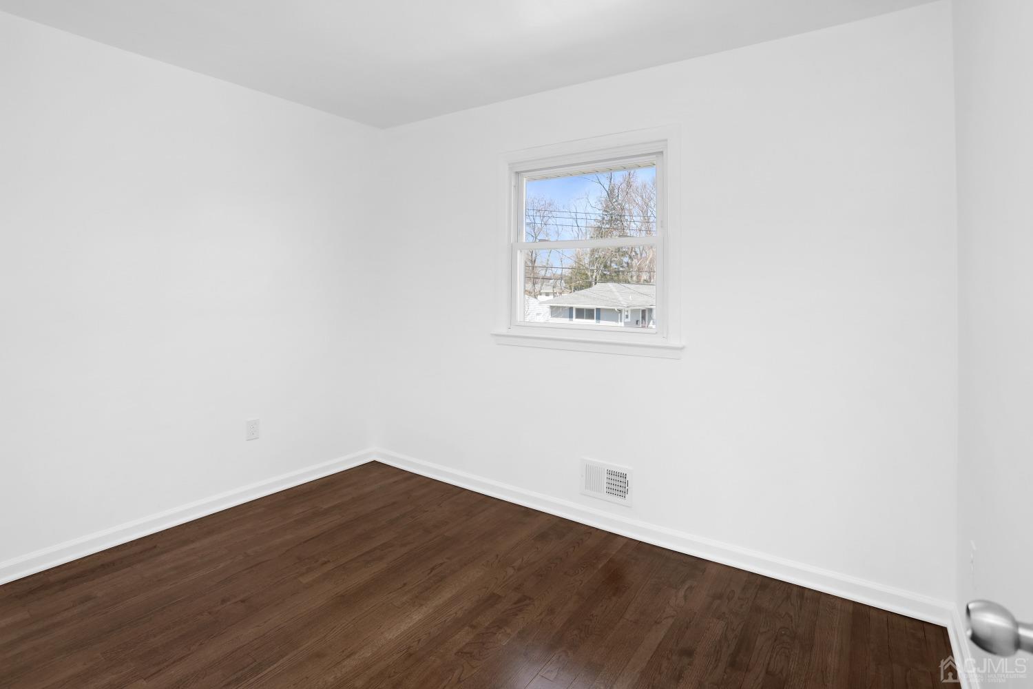 25 Mercer Road Old Bridge, NJ 08857 - Photo 23 of 30 an empty room with a workbench