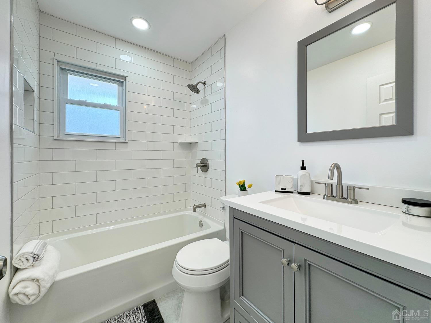 25 Mercer Road Old Bridge, NJ 08857 - Photo 24 of 30 a bathroom with a sink a toilet and a bathtub