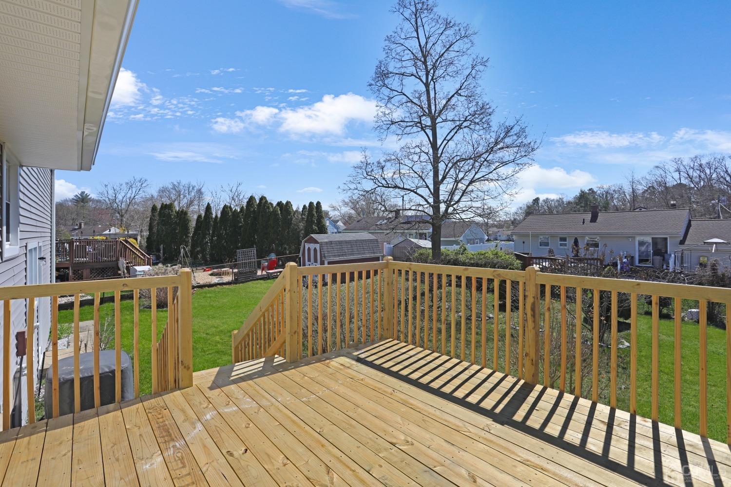 25 Mercer Road Old Bridge, NJ 08857 - Photo 27 of 30 a view of balcony with wooden floor and fence