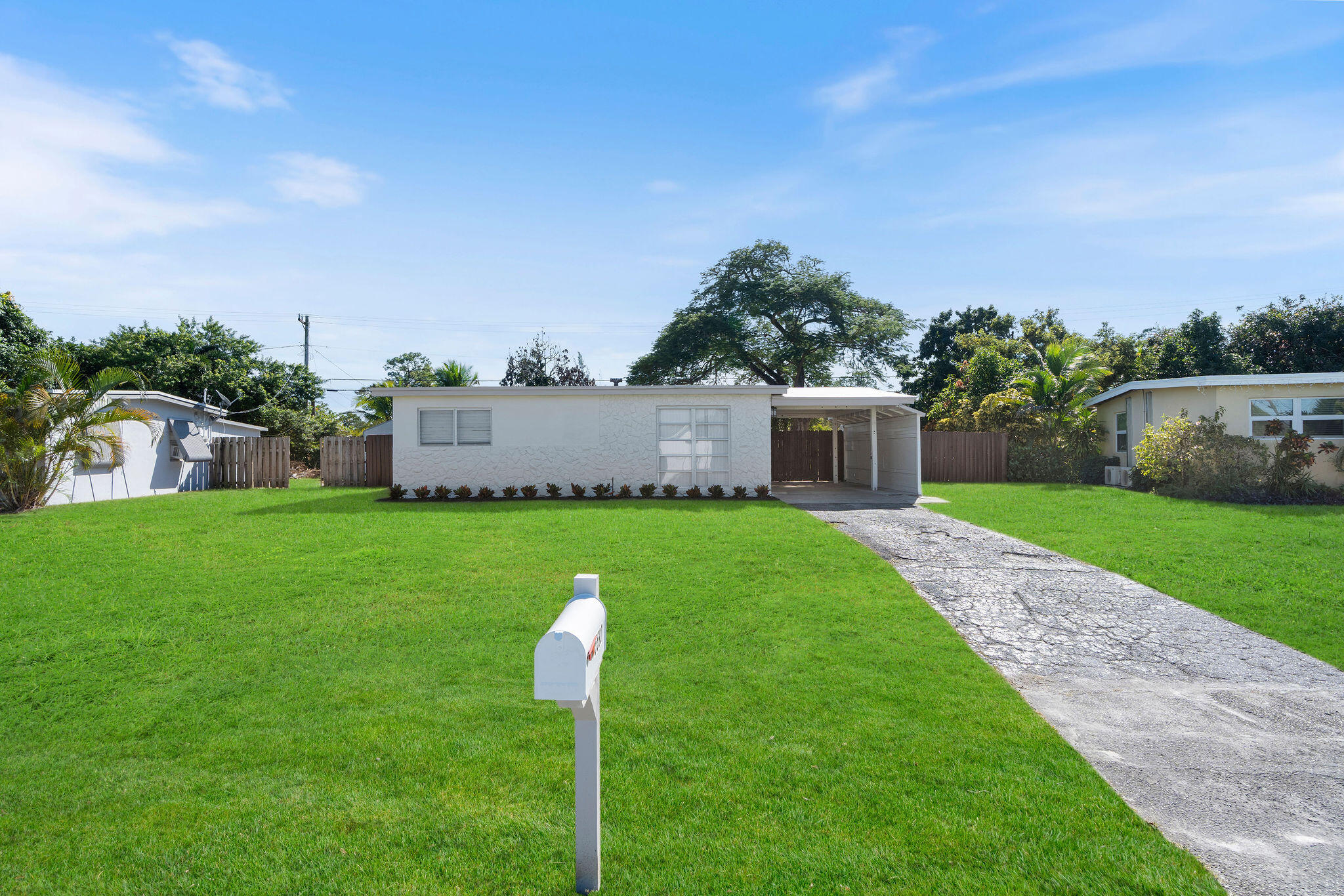 a house view with a garden space
