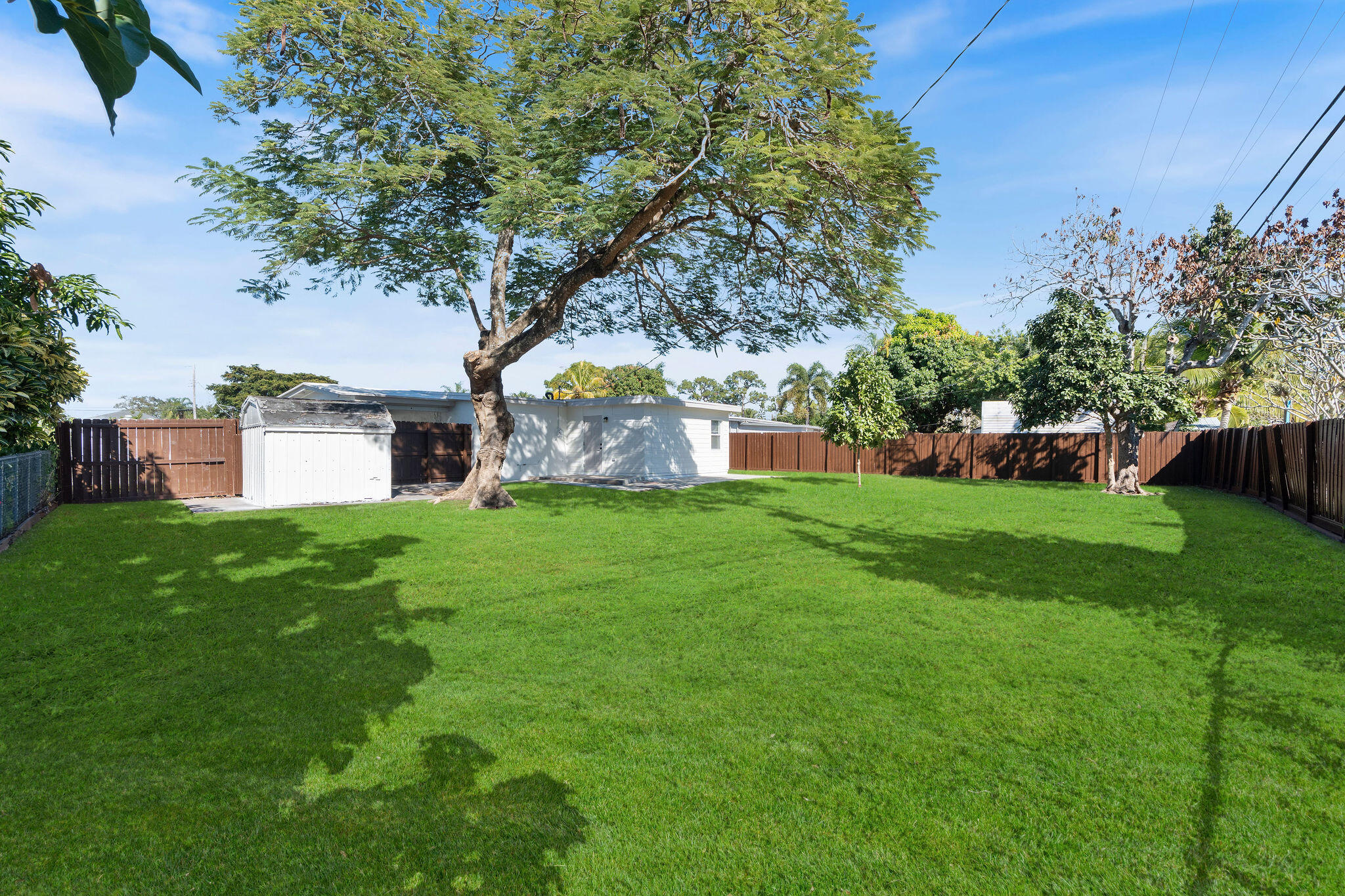 5580 Maypop Road West Palm Beach, FL 33415 - Photo 26 of 41 a view of a house with a yard