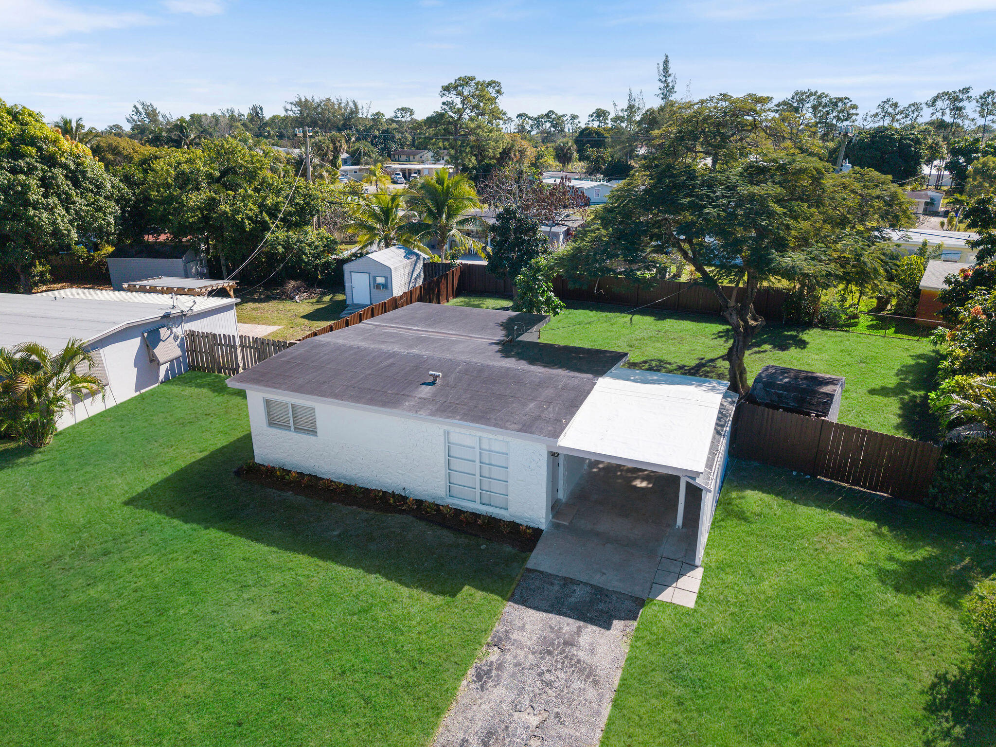 5580 Maypop Road West Palm Beach, FL 33415 - Photo 29 of 41 a view of a yard with furniture
