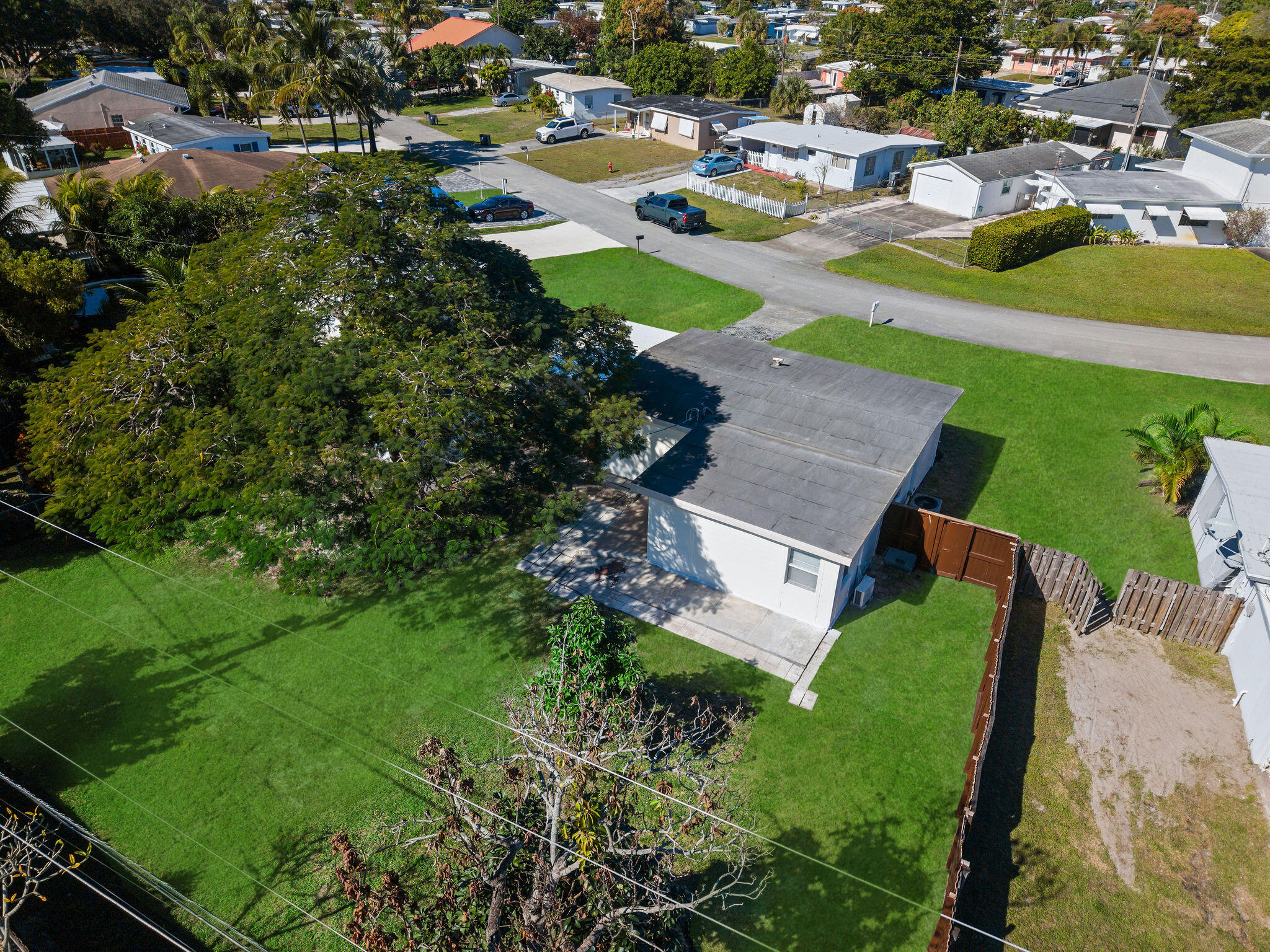 5580 Maypop Road West Palm Beach, FL 33415 - Photo 32 of 41 an aerial view of residential houses with outdoor space and swimming pool