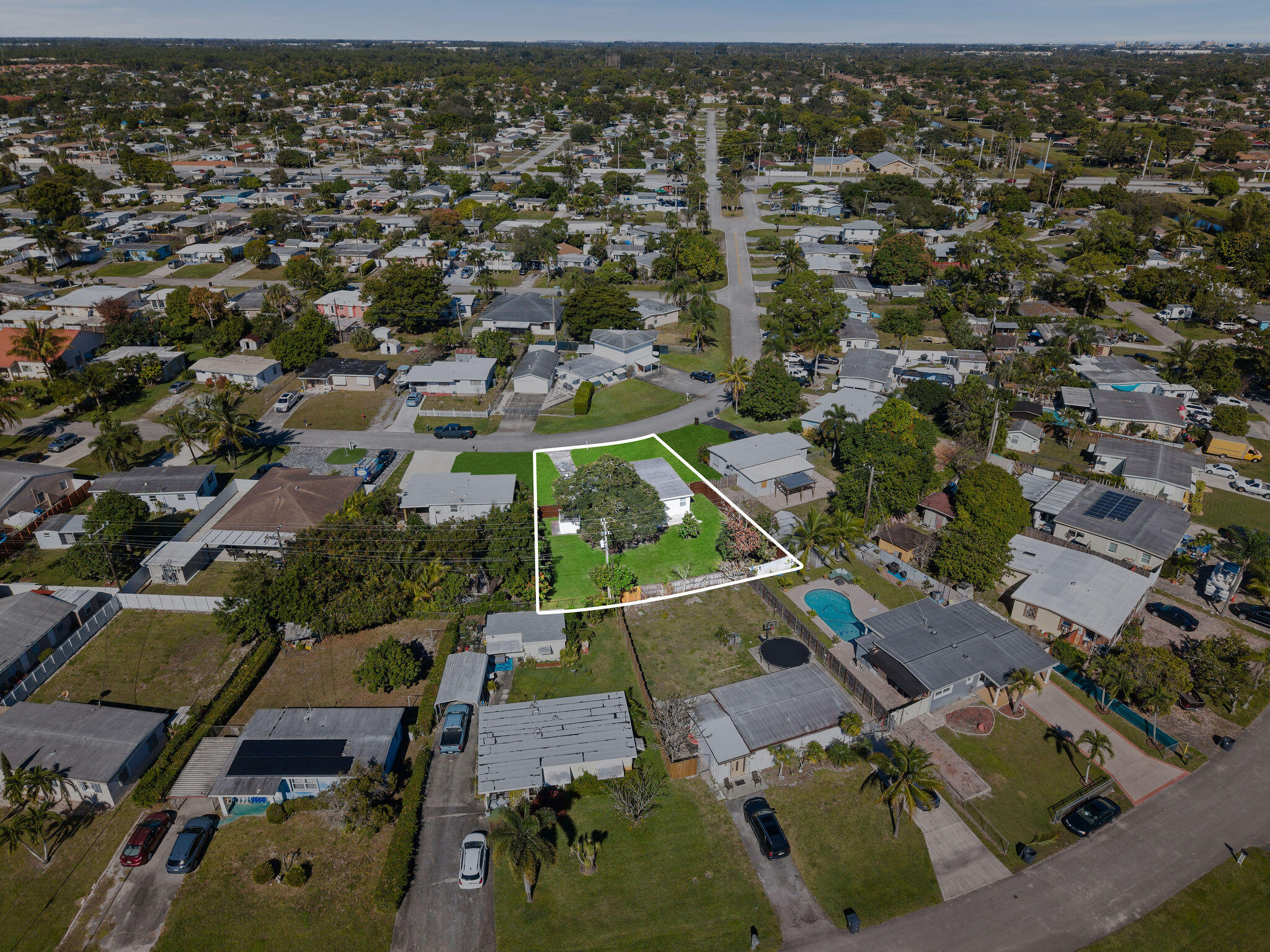 5580 Maypop Road West Palm Beach, FL 33415 - Photo 38 of 41 an aerial view of residential houses with outdoor space