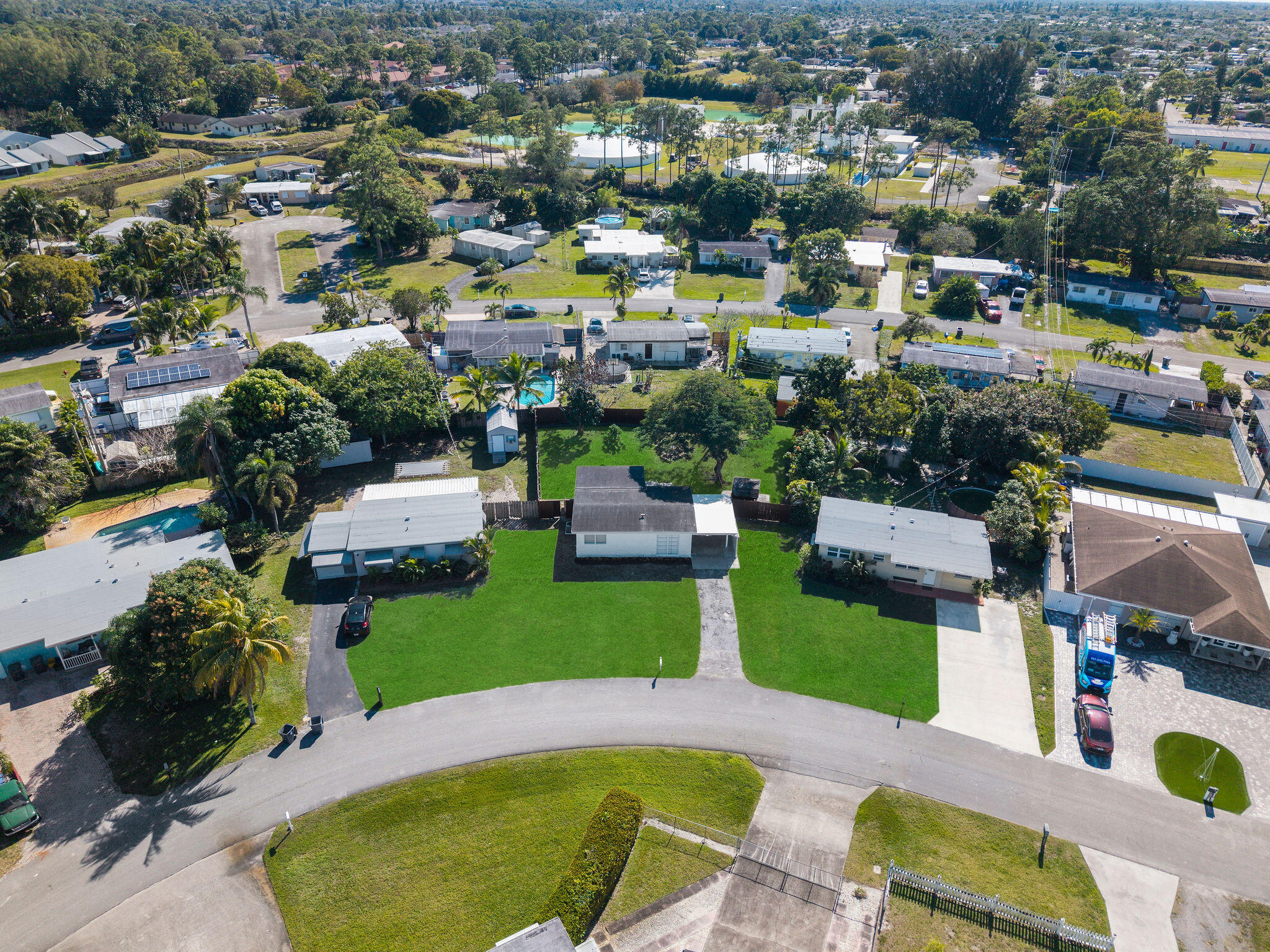 5580 Maypop Road West Palm Beach, FL 33415 - Photo 39 of 41 a view of a swimming pool and lounge chair