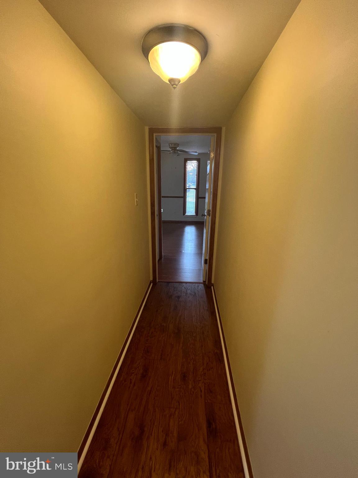 25 South Church Road Maple Shade, NJ 08052 - Photo 16 of 25 a view of a hallway with wooden floor