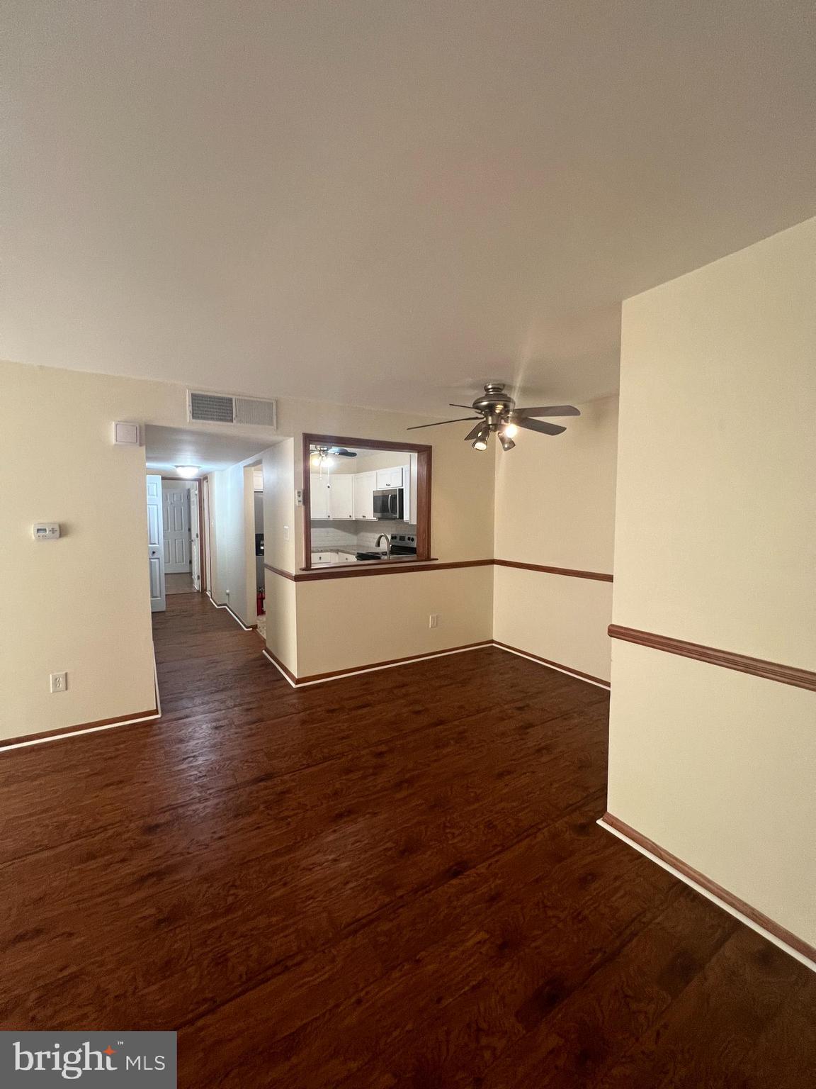 25 South Church Road Maple Shade, NJ 08052 - Photo 8 of 25 a view of a kitchen with wooden floor and electronic appliances