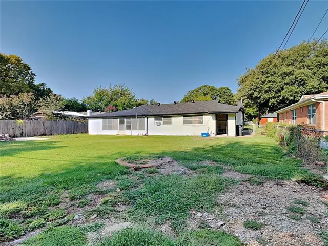 a view of a house with a big yard