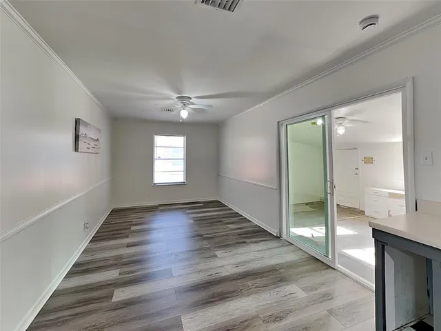 a view of an empty room and window