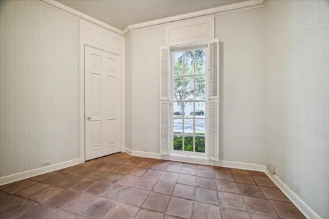 an empty room with windows
