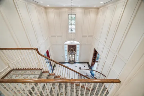 a view of a hallway with windows