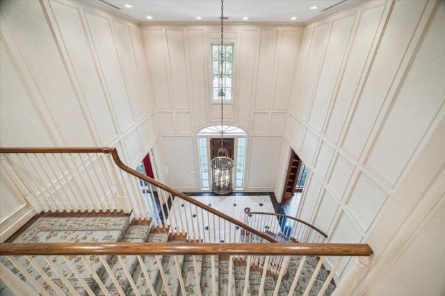 a view of a hallway with windows