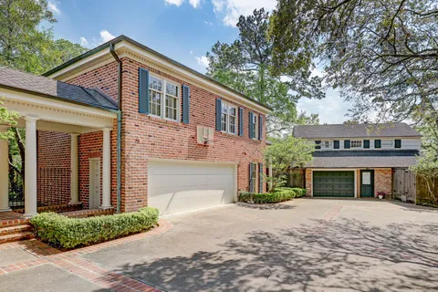 a view of a kitchen with a sink and a stove top oven