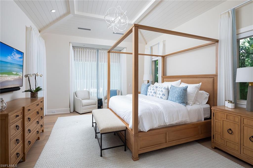 1040 2nd Street South Naples, FL 34102 - Photo 15 of 42 a bedroom with bed and window