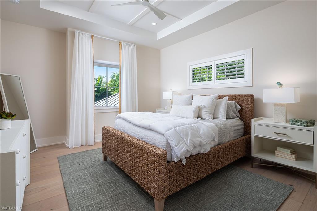 1040 2nd Street South Naples, FL 34102 - Photo 21 of 42 a bedroom with a bed and a window